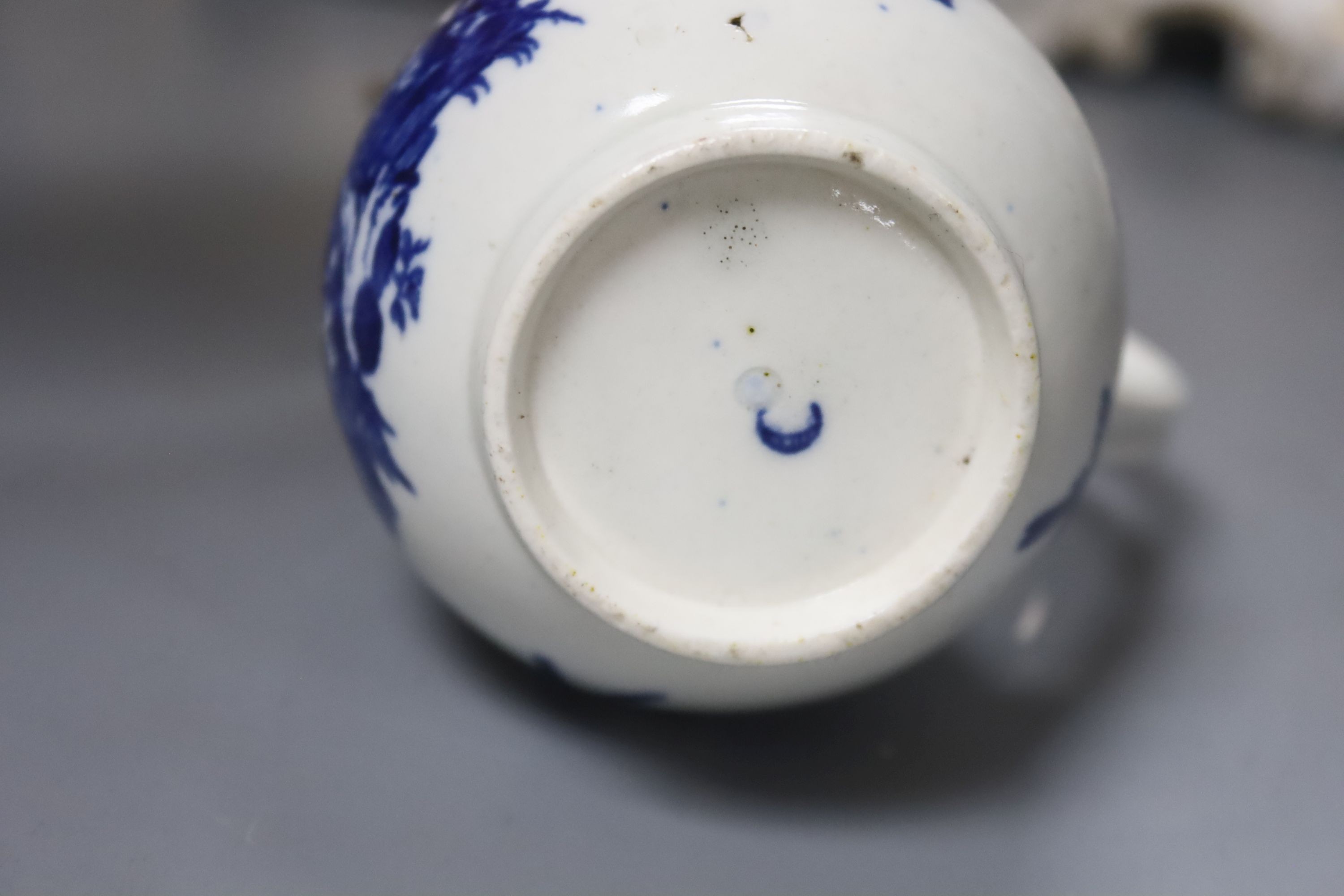 A pair of mid 19th century Jacob Petit cornucopia vases and a Worcester blue and white jug, tallest 20cm